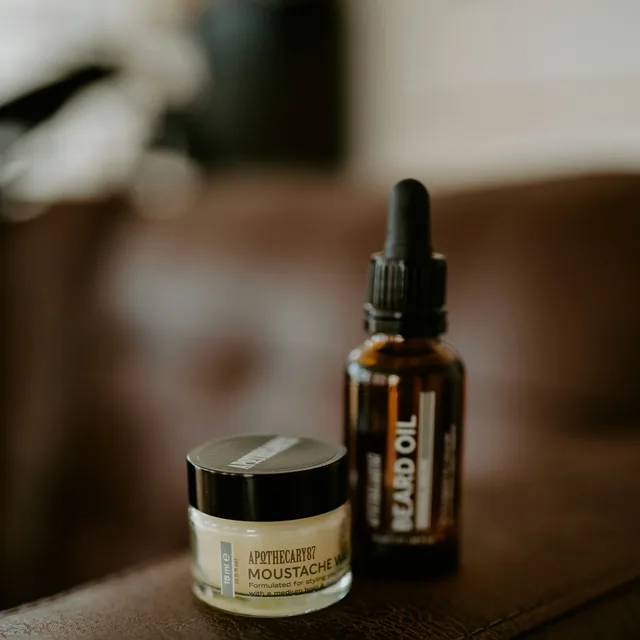 Amber glass balm jar with dropper bottle